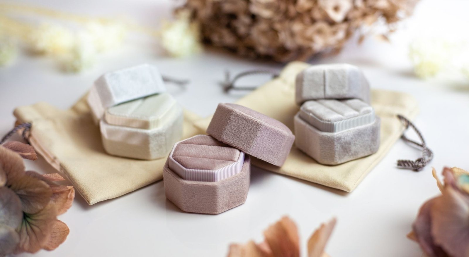 Small pastel jewelry cases and fabric presentation accessories